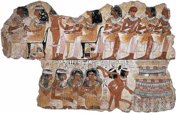 Eine Bankettszene aus der Grabkammer von Nebamum aus dem 14. Jahrhundert, die Bilder von Musik und Tanz enthält, die auf Hathor anspielen.